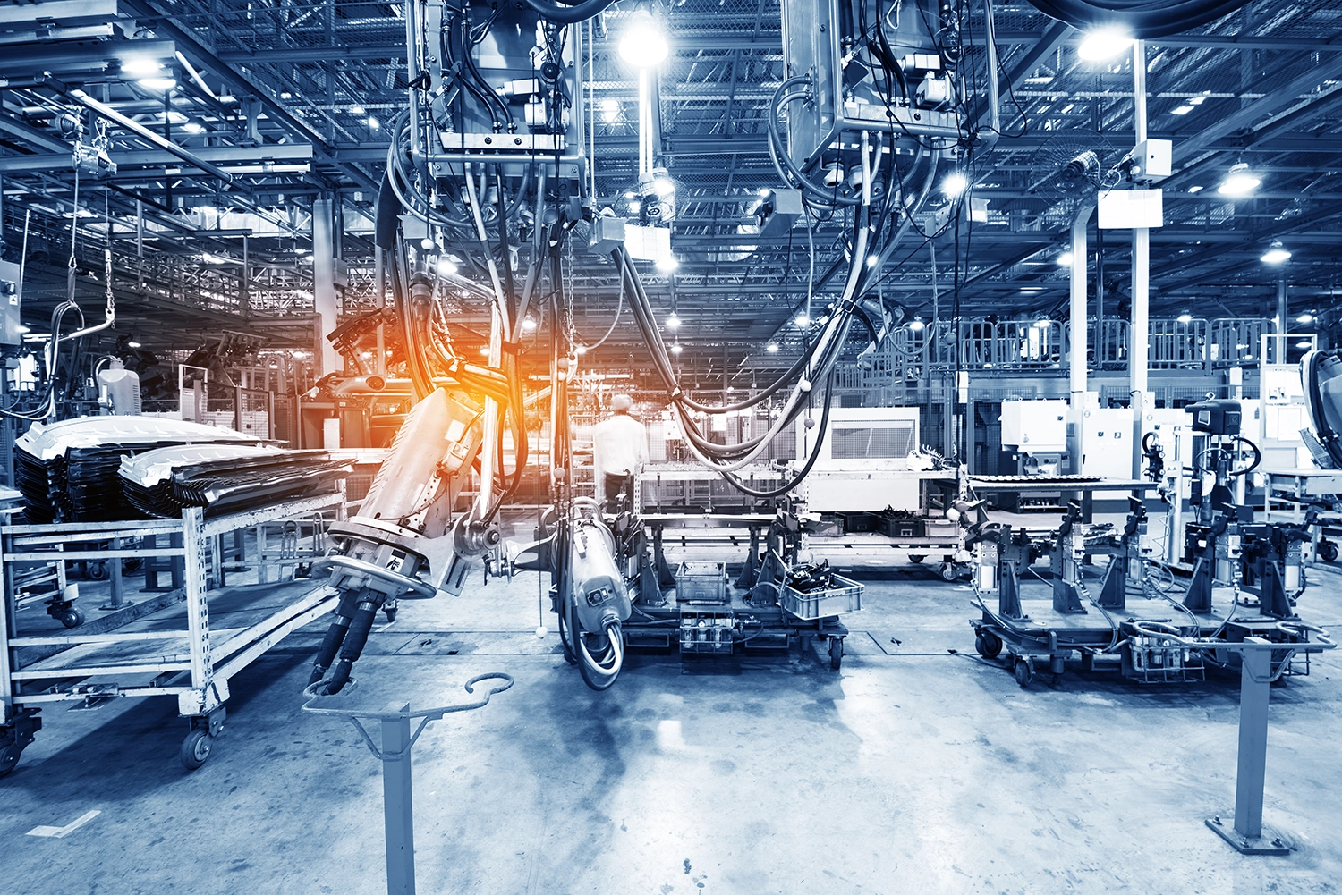Automated equipment inside an industrial manufacturing facility